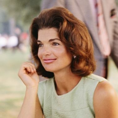 Jacqueline Kennedy enjoys herself at a picnic circa the 1960s.